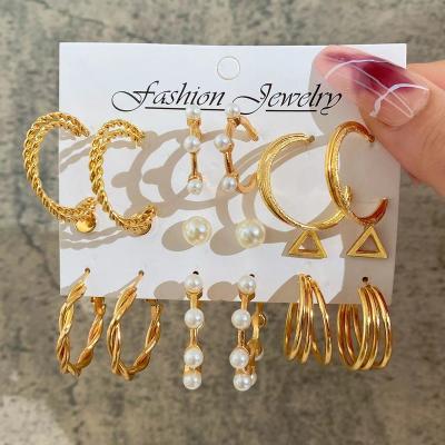 China Top Fashion Simple Cheap Eearing Set Minimal Jewelry Acrylic Pearl Butterfly Gold Circle Stud Cc Earrings Set Women for sale