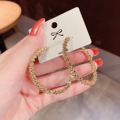 China CHUNKE FASHIONABLE Jewelry Minimalist 14K Gold Plated Brass Blossom Flower Circle Hoop Earrings For Women for sale