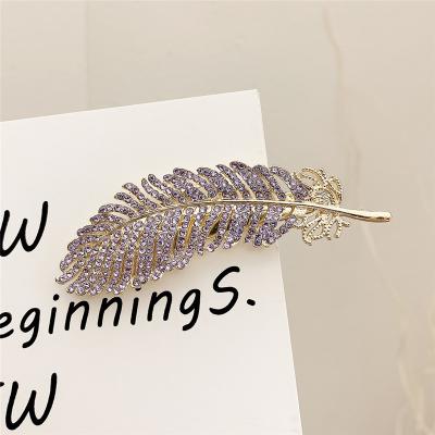 China Metal Hair Clips Leaf Rhinestone Resin Hair Clip Wholesale Soft Metal Hair Clips For Girls for sale