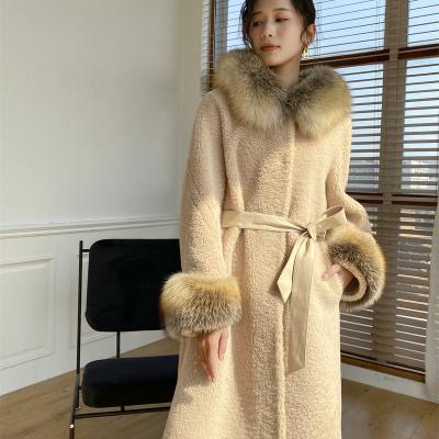 China Fashionable Winter Women Long Lamb Fur Hooded Warm Selling Breathable Fur Coat For Ladies for sale