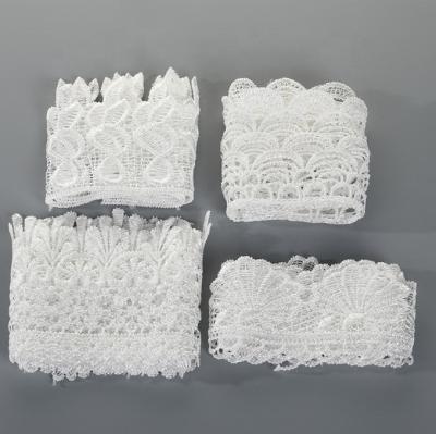 China Viable Wholesale Fancy Lace Manufacturer Polyester Cut Out White Lace Trim Embroidery for sale