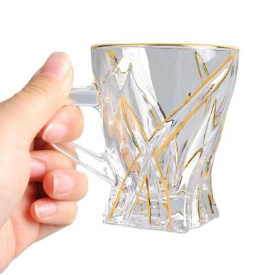 China Sustainable Gold Wire Decoration Cut Out Cheap Gift Coffee Mug Glass Cup With Handle for sale