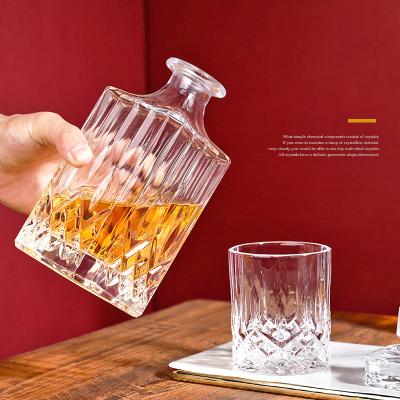 China Amazon Hot Sale Whiskey Glass Bottle Embossing Decanter For Wine Bourbon Brandy Liquor Juice Water for sale