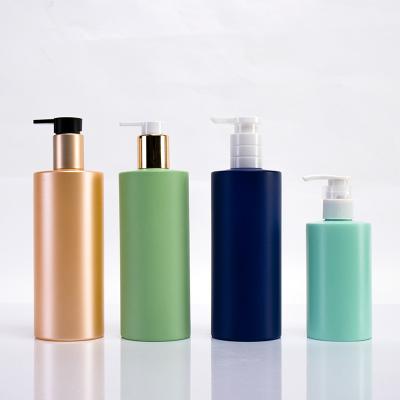 China Eco-friendly Comet Packaging Shampoo Pet Cylinder Matte Blue Green Bottle With Pump Sprayer for sale