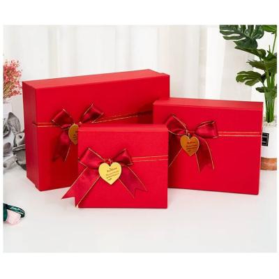 China Wholesale Custom Recycled Materials Wedding Christmas Logo Luxury Cardboard Paper Gift Packaging Box Customized Ribbon Art for sale