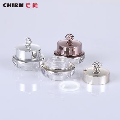 China Eye Cream Customized Luxury Round Acrylic Facial Plastic Cosmetics Cream Lid Crown Shape Empty Jar for sale