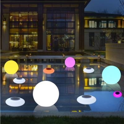 China Sports Stadiums UFO Design Solar Charging Pool Floating Lights for sale