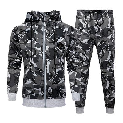 China Custom 100 Polyester Breathable Tracksuits Men Sports Jogger Set Unisex Embroidered Stitching Tracksuit for sale