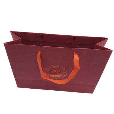 China BEAUTY PACKAGING portable custom luxury fancy paper cardboard embossed cheap logo biodegradable shopping bags with handle for sale