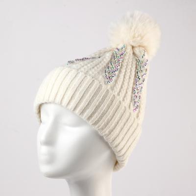 China Wholesale JOINT Fashion Diamond Hats For Girls Winter Customized Pompom Beanie Hats for sale