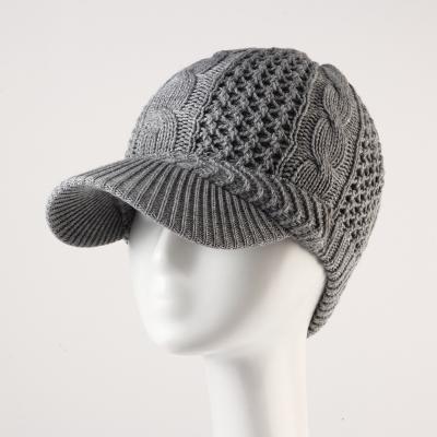 China JOINT hot sale female knitted peaked hat women beanie hats keeping manufactorers warm for sale