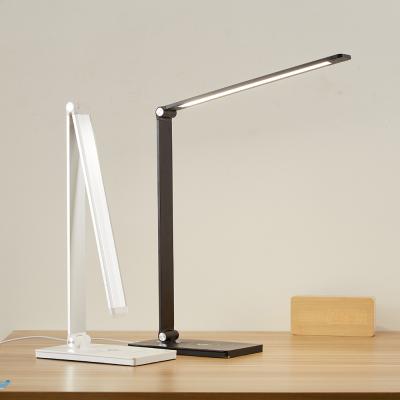 China Modern Adjustable Led Desk Lamp USB Light Charging Left Wireless Charging Folded Led Table Lamps for sale