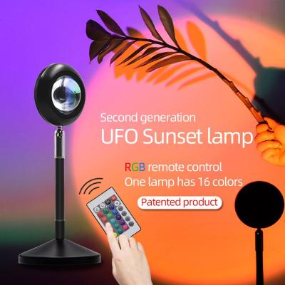 China Wholesale Modern Decoration Atmosphere Romantic Rainbow Led Projector Light RGB 16 Colors UFO Sunset Lamp for sale