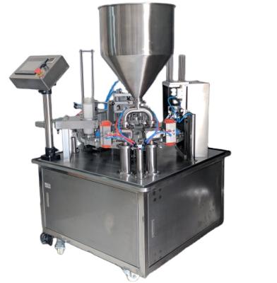 China automatic food cup filling and sealing machine, yogurt cups filling and sealing machine price for sale