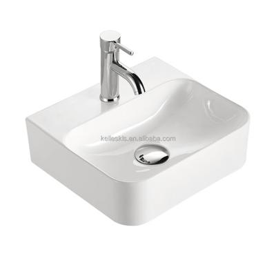 China Easy Clean Modern 2001 Counter Top Artistic Hand Wash Ceramic Bathroom Basin for sale