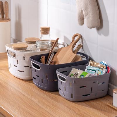 China Sustainable Storage Basket With Handle Cosmetic Storage Box Desktop Sundries Organizer Household Makeup Kitchen Plastic Storage Container for sale