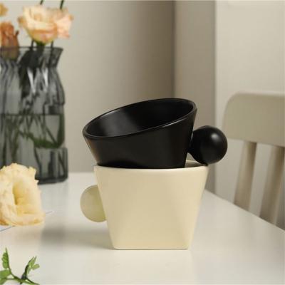 China Viable Wholesale Creativity 200ml Unique Couple Handmade Irregular Latte Cup Cappuccino Espresso Handle Ball Ceramic Coffee Mug for sale