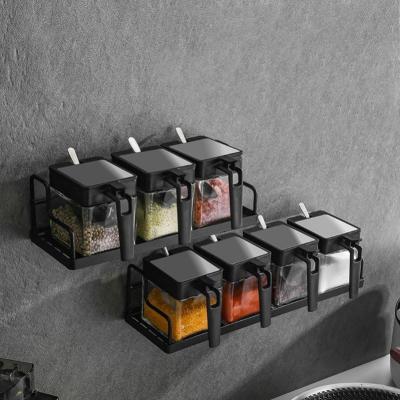 China Viable Can Be Hung On The Wall Glass Seasoning Box Kitchen Supplies Household Large Full Salt Can Oil Glass Bottle Set With Metal Frame for sale