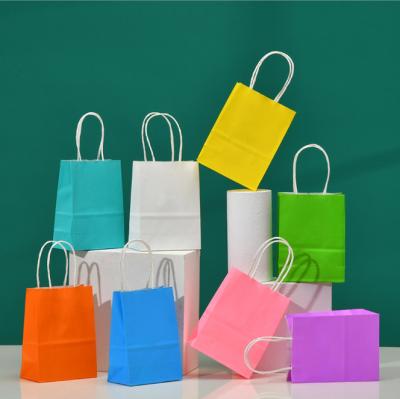 China Handbag Style Recyclable Concise Kraft Paper Bags Lightweight Gift Bag For Packaging Clothes And Gifts for sale