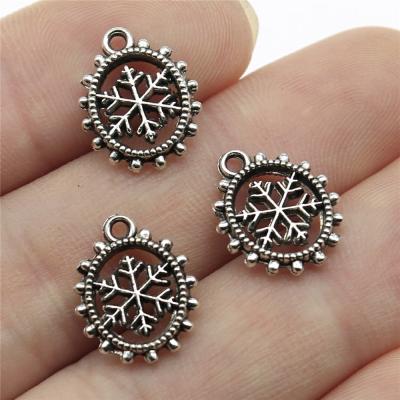 China Vintage 100pcs/bag 15x11mm Antique Silver Plated Zinc Alloy Oval Snowflake Charms Pendants ABD-C13060 for sale