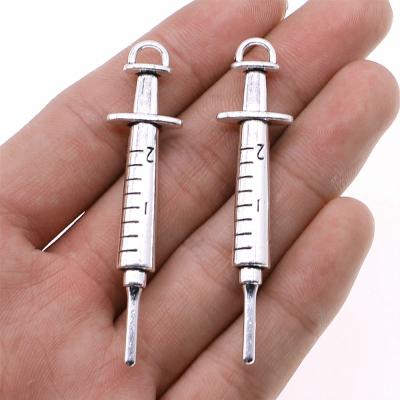 China Vintage 50pcs/bag 15x62mm Antique Silver Plated Bronze Plated Zinc Alloy Syringe Charms Pendants ABD-C11190 for sale