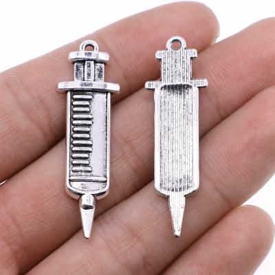 China Vintage 100pcs/bag 13x43mm Antique Silver Plated Bronze Plated Zinc Alloy Syringe Charms Pendants ABD-C11191 for sale