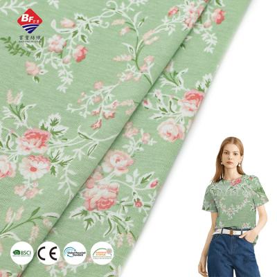 China Anti Pill 60%cotton 40%rayon 140gsm soft squishy print stretch knit jersey fabric for women dress for sale