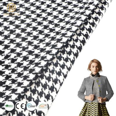 China Custom Black And White Polyester Herringbone Women's Tweed Fabric Breathable Tweed Wool Tweed Fabric for sale