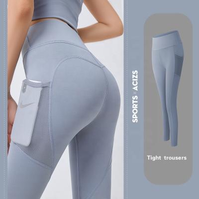 China 2021 New Design Workout Sportswear High-waisted Pocket Side Buttocks Sweatpants Breathable Yoga Lifting Pants for sale