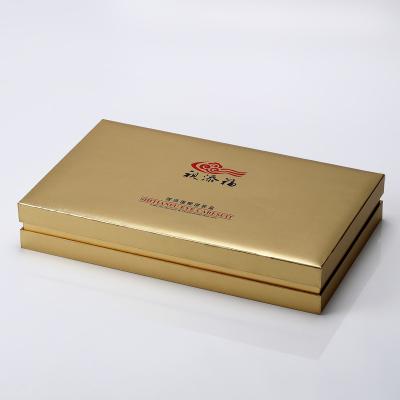 China Recycled materials factory direct wholesale custom gold and silver card color printed skin care essence packaging boxes for sale