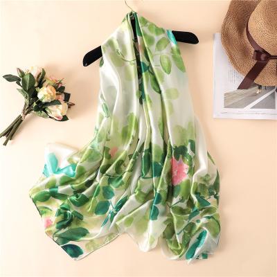 China 2021 Newest Yiwu Scarves Women Shawls Soft Smooth Feeling Silk Neck Scarf Wholesale Girls Light Silk Leaf Printed Shawls for sale