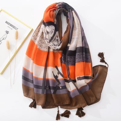 China Newest Design Soft Smooth Ladies Long Soft Feeling Cotton Scarves For Women Summers Printed Shawls Premium High Quality Cotton Scarf With Tassel for sale