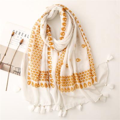 China Soft touch feeling wholesale new design muslim hijab for women 100% cotton viscose printed scarf with tassels ladies white gold tan scarves for sale