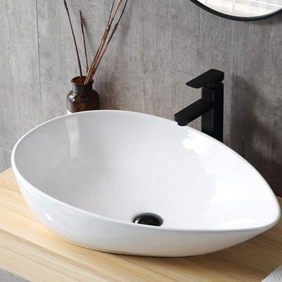 China Modern Minimalist Italian Design Art White Ceramic Bathroom Vanity Wash Basin Bathroom Sink Counter Luxury Sale for sale