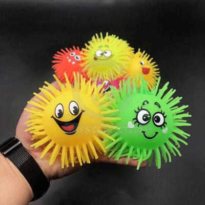 China Tpr Multiple Soft Emotional Face Expression Spiky Squeeze Flashing Ball Wiggle Squishy Fluffy Bouncing Pipper Ball With Yoyo Toy for sale