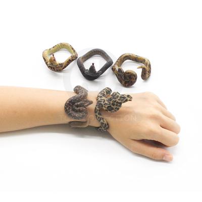 China Hot Plastic Emulational Snake Wristband Trick Wrist Toy For Boys for sale