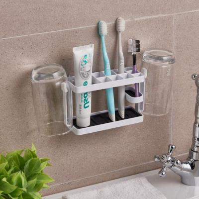 China Wall Mounted Viable Metal Silicone Toothpaste Organizer Toothpaste Holder Toothpaste Holder for Bathroom Bathroom Toiletries Storage Rack for sale