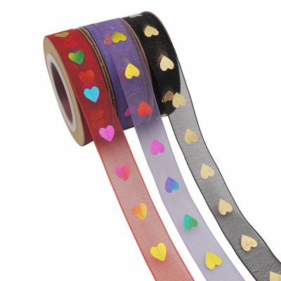 China 2021 Viable New Design 100% Polyester 5/8 Inch Hot Stamping Cerebration Gold Foil Luxury Sheer Organza Printed Ribbon For Gift Package for sale