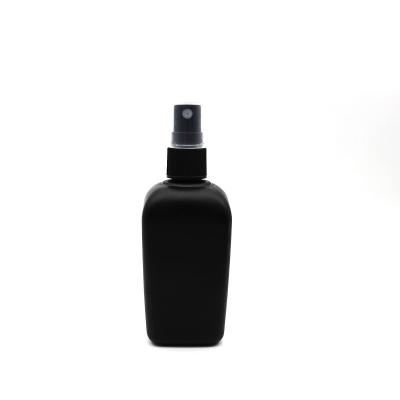 China 100ml Square Cosmetic Painted Matte Black Frosted Glass Perfume Bottle With Plastic Spray Cap for sale