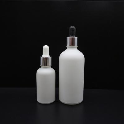 China Wholesale Stylish Dropper Matte Frosted 30ml 50ml White Glass Dropper Bottle With Gold Silver Aluminum Pipette Cap for sale