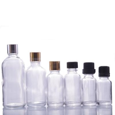 China Wholesale Cosmetic Empty Clear Glass Bottle With Screw Cap For Essential Oil for sale