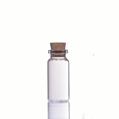 China Personal care 5ml 6ml 8ml 10ml 12ml all mini size wholesale glass bottles with corks lid for sale