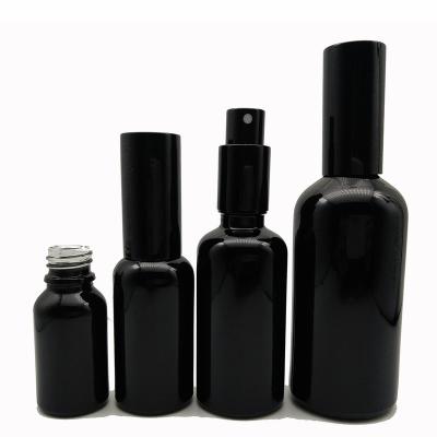 China Spary Sale 30ml 50ml Perfume Essential Oil Spray Glass Shiny Black Bottles With Black Spray Cap for sale