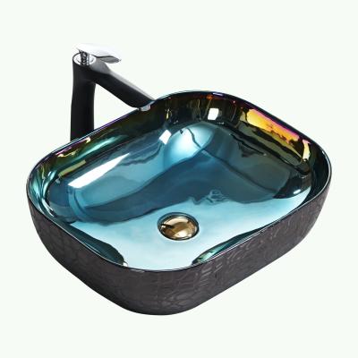 China Easy Clean Surface Polarized Stone Blue Surface Texture Plated Color Art Basin Bathroom Sink for sale