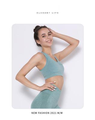 China Breathable Fashionable Soft Yoga Bra Workout Fitnesss Women Gym Wear Woman Seamless Top Cross Fitness Clothing for sale