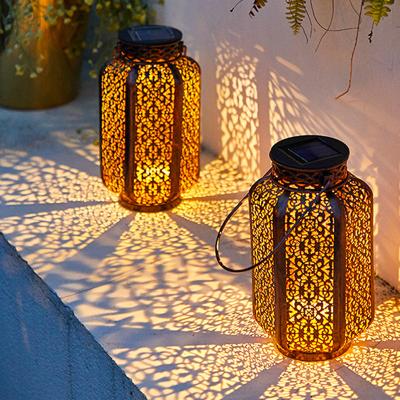 China Outdoor Waterproof Led Solar Garden Decoration Metal Home Spotlight Lawn Lights Garden Hanging for sale