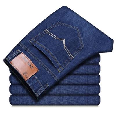 China Jeans para hombres de estiramiento grueso tubo recto suelto cintura alta talla más lavado casual lavado de arena en venta