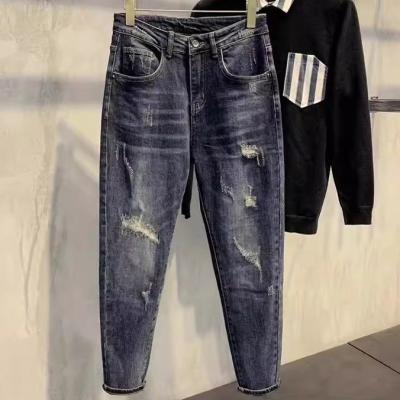 China Meia cintura XMAMLON Hip Hop masculino Streetwear Skinny Damages rasgado jeans calças calças à venda