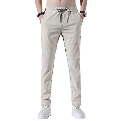 China Pantalones de tela para hombres Impresión digital Techwear Gurkha Pantalones de pista de paracaídas en venta