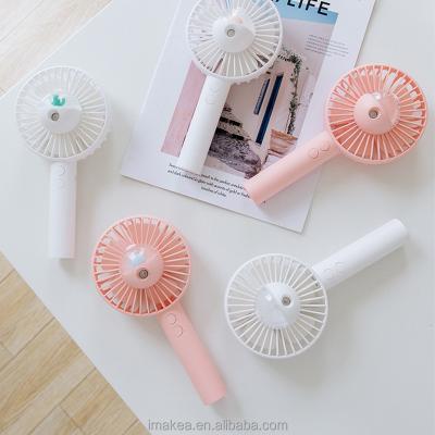 China Spray Handheld Fashion Mini Hand Held Fan Portable Smooth Practical Electric Fan For Summer New for sale